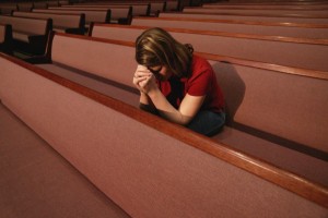woman-church-praying-e1404830992353